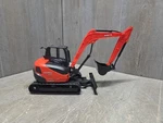 12" Long New Ray Orange Kubota KX080-4 Excavator Used. Price: $21.25.