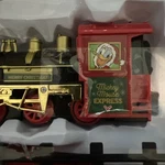 Disney Mickey Mouse Holiday Express 12-PIECE Ready Play Train Set Open Box New. Price: $24.90.