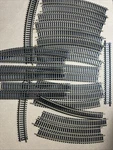 Tyco Train Tracks 27 Pieces Curved Straight Atlas Austria 15685 15665 Used. Price: $30.00.