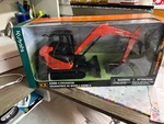 New Ray Orange Kubota KX080-4 Excavator, In Box # 354 Used. Price: $25.00.