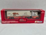 Alan Kulwicki #7 Hooters Racing Champions Transporter Diecast 1:87 1993 Edition New. Price: $6.95.