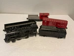 Lionel Gauge 1062 Locomotive & Lines Tender With 3 Cars. Untested. #16 Used. Price: $40.00.